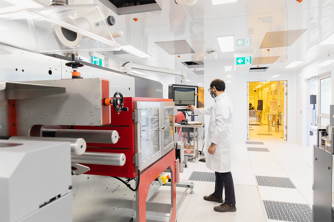 A man working in a  technology lab.